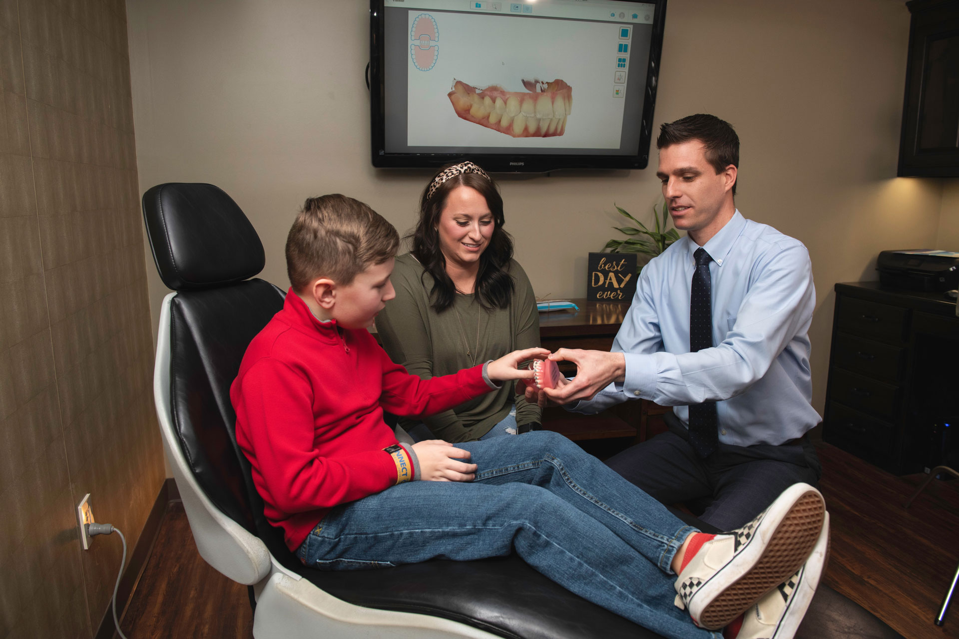 Dr. Clendenen with a young patient